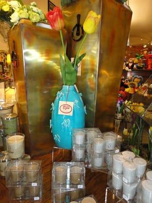 Scented palm oil candles and dragonlyfly vase are some of the home accessories you will find in store.