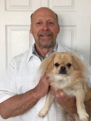 Dr. William Stocker and his furry 4 legged family member "Odie"