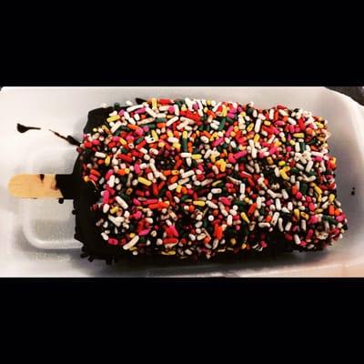 Monarca Michoacana: chocolate paleta, dipped in chocolate, added candy/ rainbow sprinkles