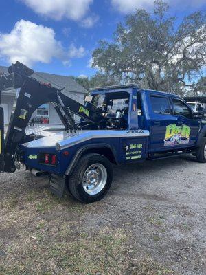 Pretty blue tow truck ready to roll 24hrs a day