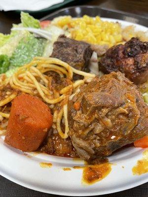 Stewed meats, jerk chicken, spaghetti, broken rice, and some salad for lunch!