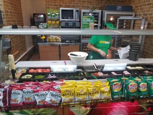 Sandwich artist at work.