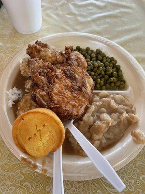 Fried pork chop a white beans and peas