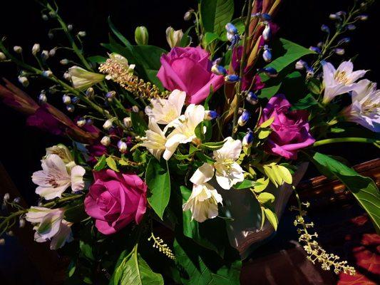 A beautiful arrangement of roses, alstromaria, delphinium and gladiolas.