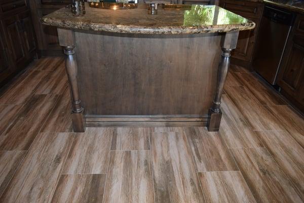 Beautiful floors in Kitchen and Master Bath.  Can you believe this is tile!