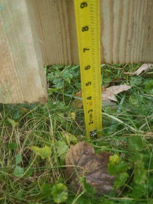 Industry standard gap for the bottom of a fence should be 2-4 inches