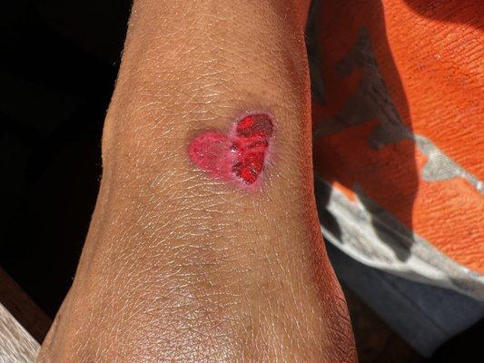 red heart tattoo