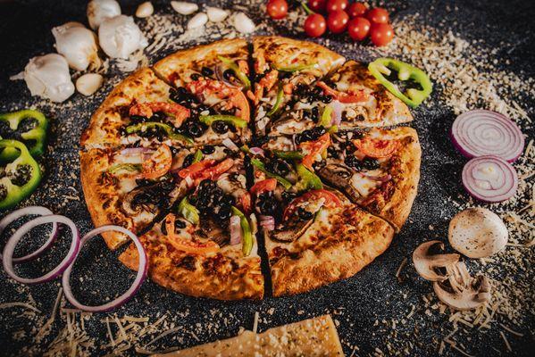 Vegetarian Pizza
(mushroom, onion, bell pepper, tomato, black olives)