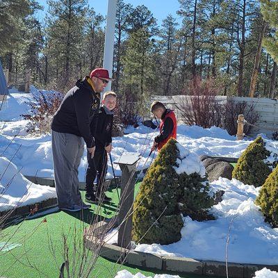 Playing mini golf in the snow 2021.