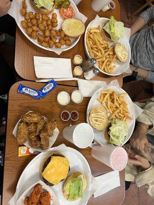 2. 1/2 lb. Burger Combo with fries and tater tots Garlic and hot wings