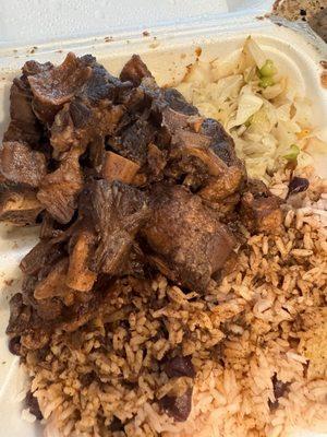 Brown Stew Oxtail, Cabbage and Rice and Peas