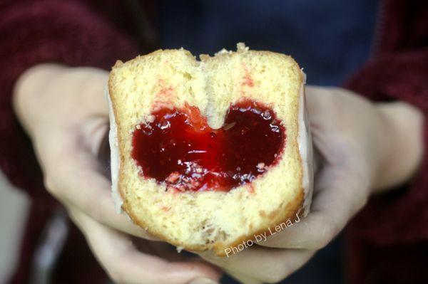 Inside of Strawberry-Filled Donut - strawberry jam is completely smooth/goopy, on the sweet side