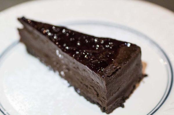 Dangerous Chocolate
 Fudgy dark chocolate cake, raspberry liqueur sauce