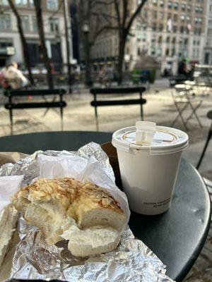 Asiago bagel with cream cheese, coffee