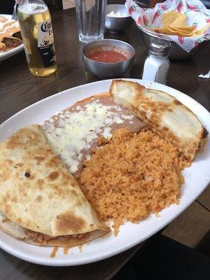 Chicken and beef quesadillas, rice, and beans