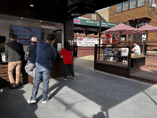 View of ordering area and adjacent patio seating