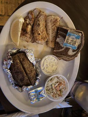 Pan seared cod, baked potato, coleslaw, and marble rye bread