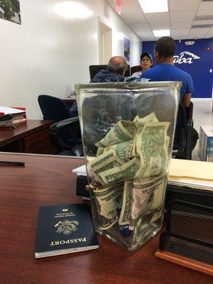 Tip jar on each desk...that's just weird in a travel agency isn't it? They're not servers and get paid more than minimum. So why