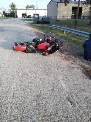 Motorcycle laid down, total carnage