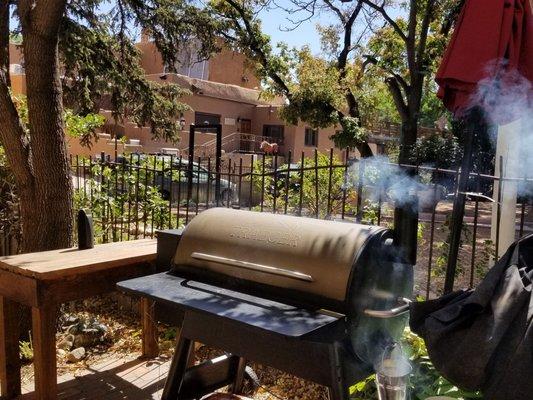 Burgers are cooked on this smoker.