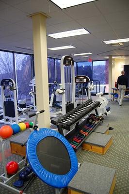 The main gym area of Blue Hills Sports and Spine Rehabilitation's Braintree office