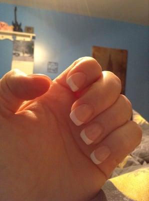 Gel nail with white tips.