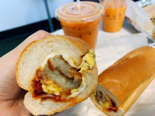 Bacon egg cheese with hash brown on a hoagie roll with saltpeppaketchup / Thai tea (food insta: @aje.eats)