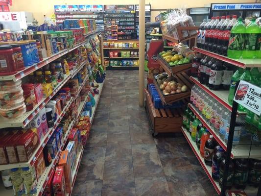 Produce, bread, groceries, and 2 liters.