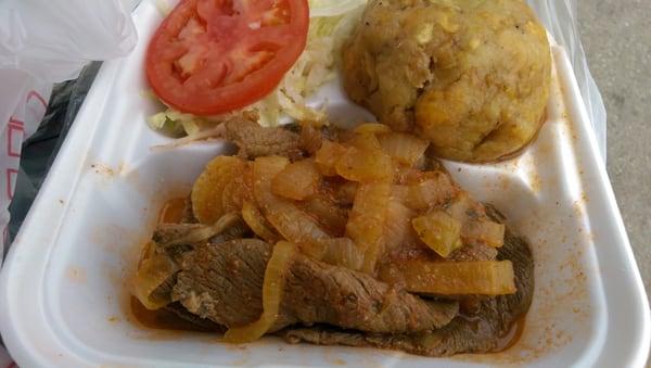 Mofongo with steak and onions