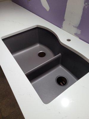 Undermount sink and Handsome Quartz countertop installed