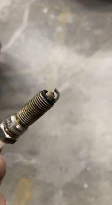 Diagnosed malfunctioning spark plug causing a misfire.