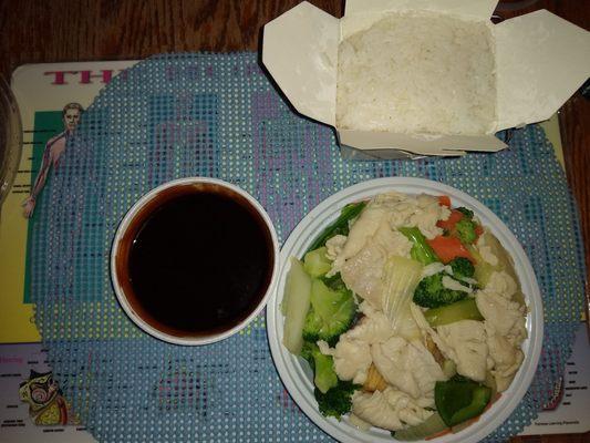 Steamed chicken and veggies (minus water chestnuts) with side of sauce and white rice