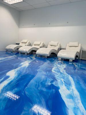 Our customer design metallic epoxy resin floor is unique and one of a kind. No other IV spa has this!