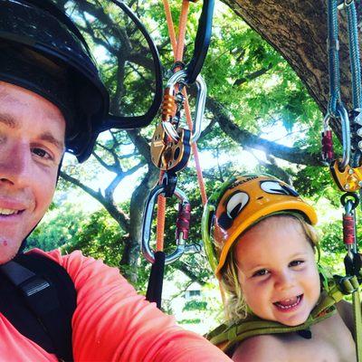 Eric & his son climbing together when they lived on Kauai