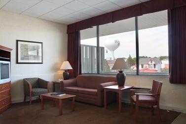 King Suite (Room 324) living room area, balcony overlooking Rehoboth Avenue and water tower