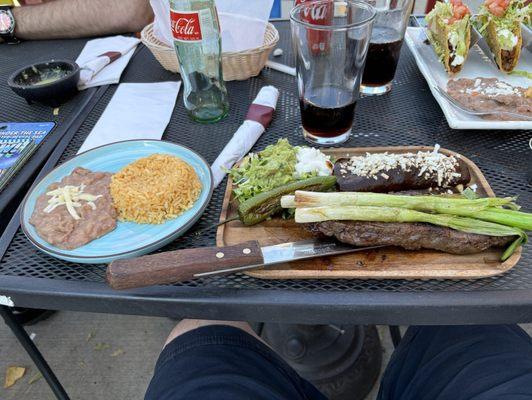 Carne a La Tampiqueña. This is a tough skirt steak but hand cut in-house. Portions are large and fair.