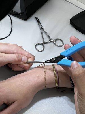 Permanent bracelet being placed on my wife