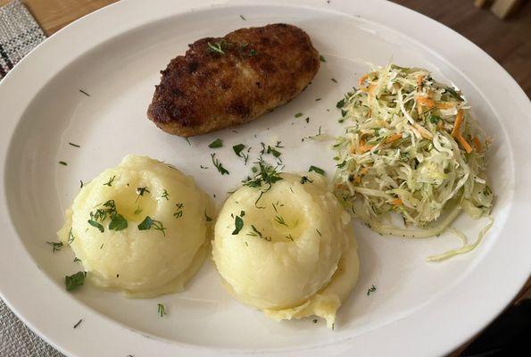 Pork cutlet with potatoes and salad