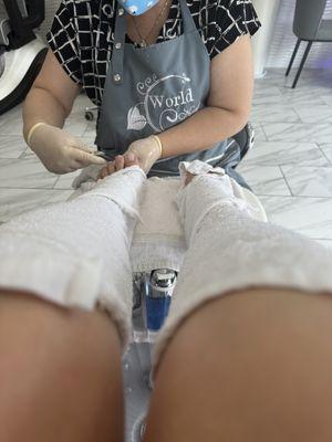 Pedicure with hot towels