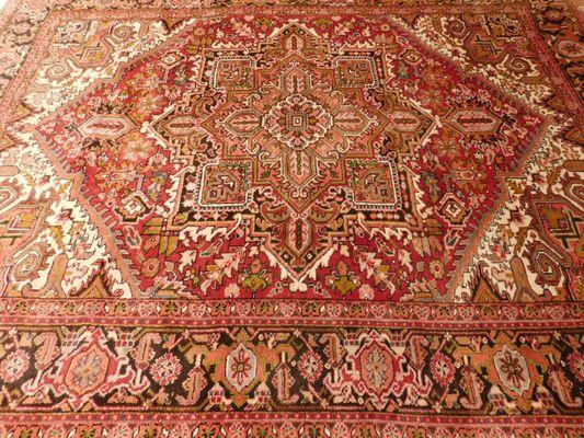 Antique Persian Rug by Nasser Luxury Rugs.