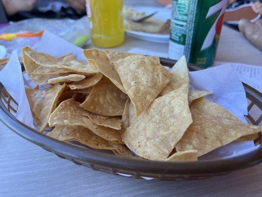 Complimentary chips with salsa. Crispy, warm, and no grease.