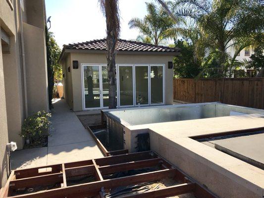 Custom built home gymnasium with Panoramic window wall system.