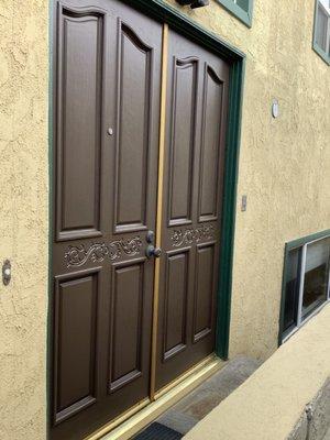 Double solid wood front door.