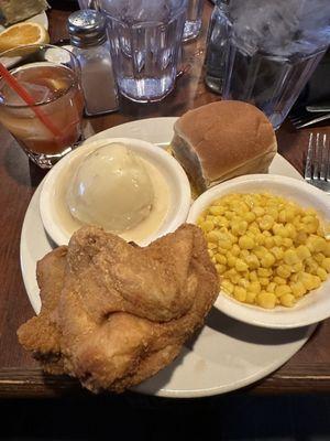 Sunday special of fried chicken with sweet corn and mashed potatoes along with an old fashion