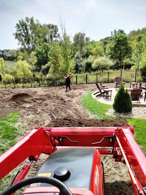 Added the topsoil leveled and graded.