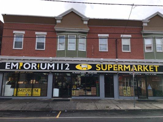 Great new storefront for Emporium 112 Supermarket. What an impact it makes in the neighborhood.