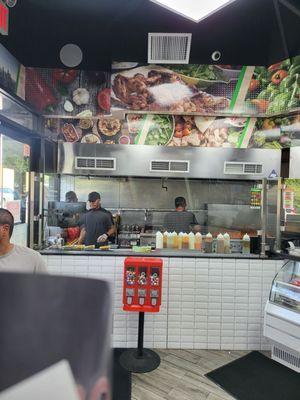 Chefs at work making that delish jerk chicken we all love