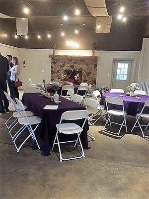 The Stable is a lovely event space with a large stone fireplace. Can seat up to 100