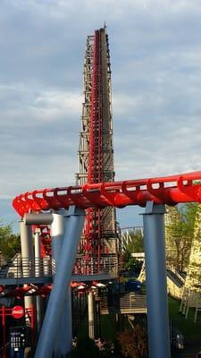 The lift hill gleams a shade of bright crimson in the pre-dusk sunlight :)