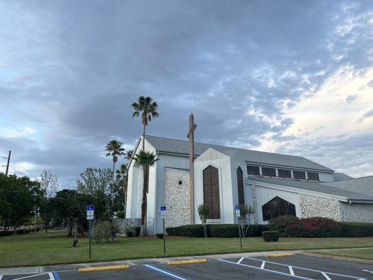 Angel as a hawk stands guarding the Parish Temple.